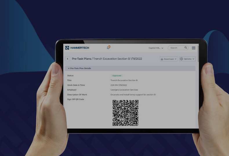 Image of hands holding a tablet using HammerTech's Pre Task Plans workflow for safer job sites and improved field engagement.